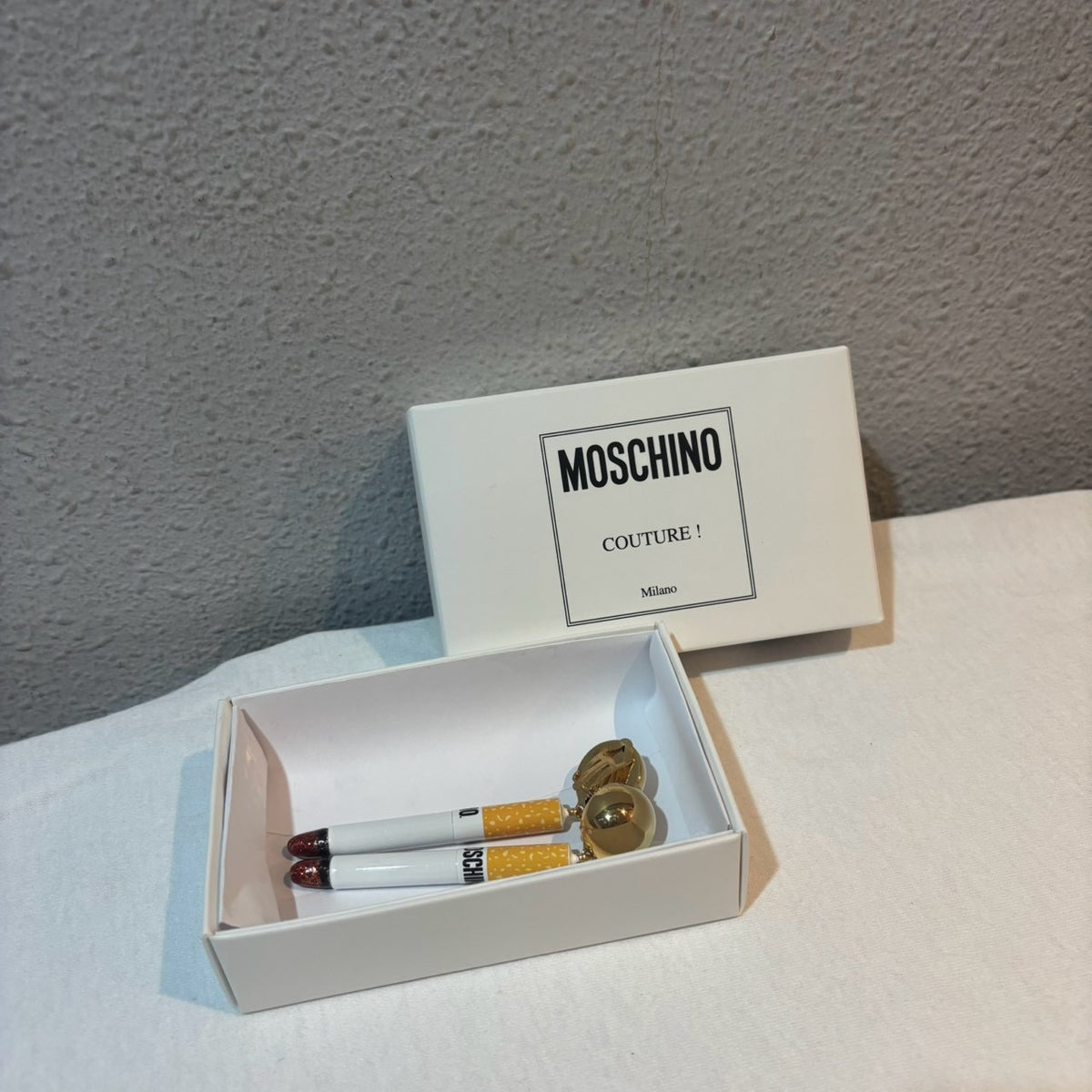 【MOSCHINO】 シガレットモチーフ イヤリング ゴールド